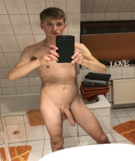 Nude twink with a huge cock