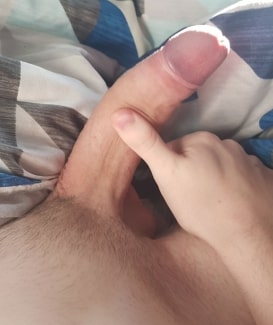 Erected smooth shaved uncut penis