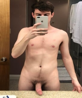Nude boy with a hairy boner