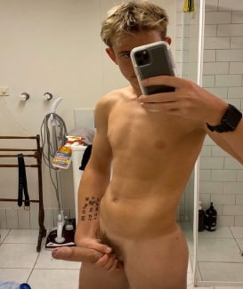 Blonde boy taking nude pics