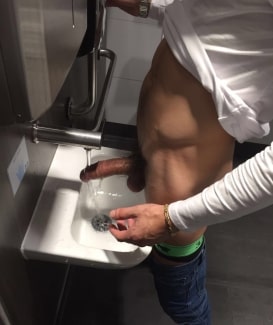 Guy washing his big cock