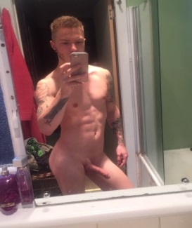 Nude tattooed selfie boy