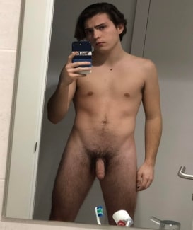 Nude boy with soft cock