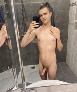 Nude boy with erected penis