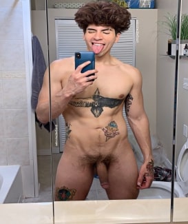 Tattooed nude boy